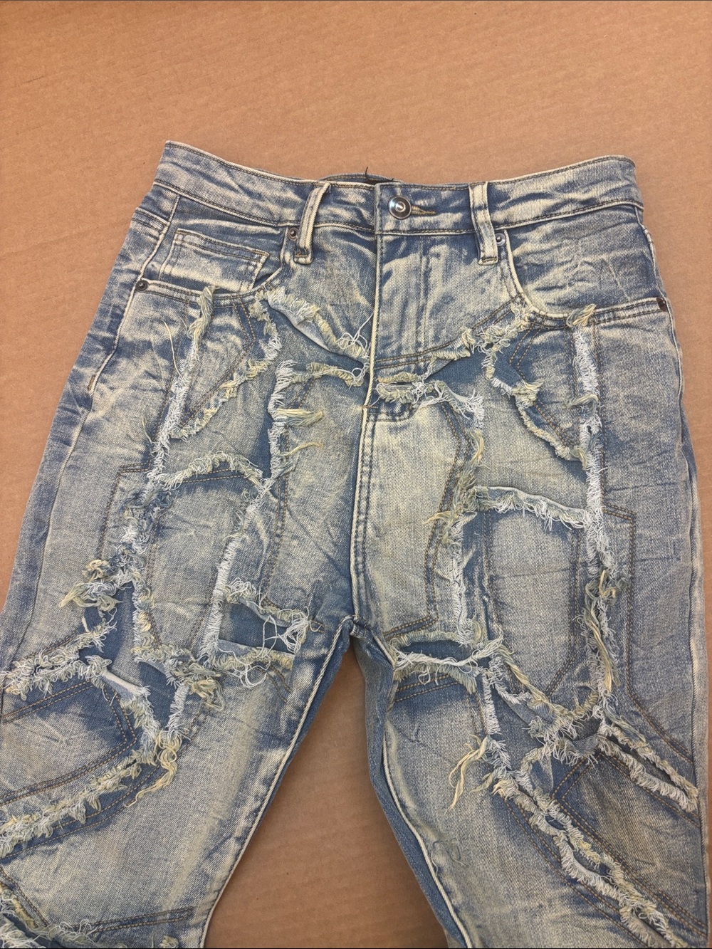 Distressed Light Blue Men’s Jeans